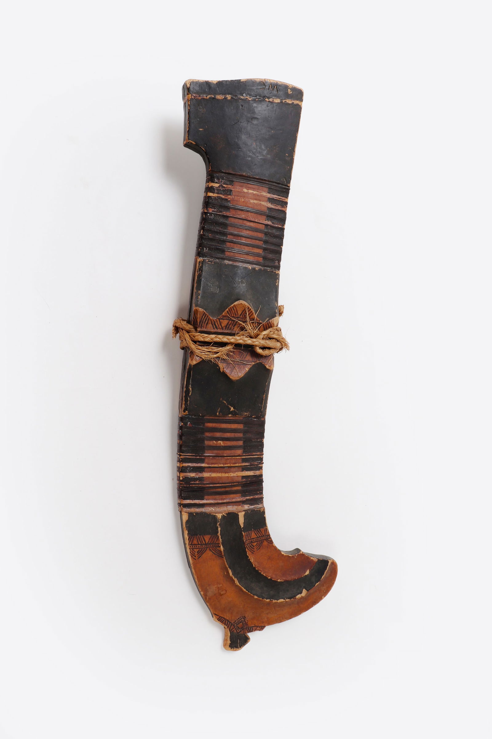 Gorgeous Mindanao Scabbard, Mandaya Peoples: Philippines, Mindanao, Lumad late 19th - 20th century. Mandaya museum scabbard in fine black and wood tattooed pattern with fine natural fibers. A rare and excellent example with counterparts displaye