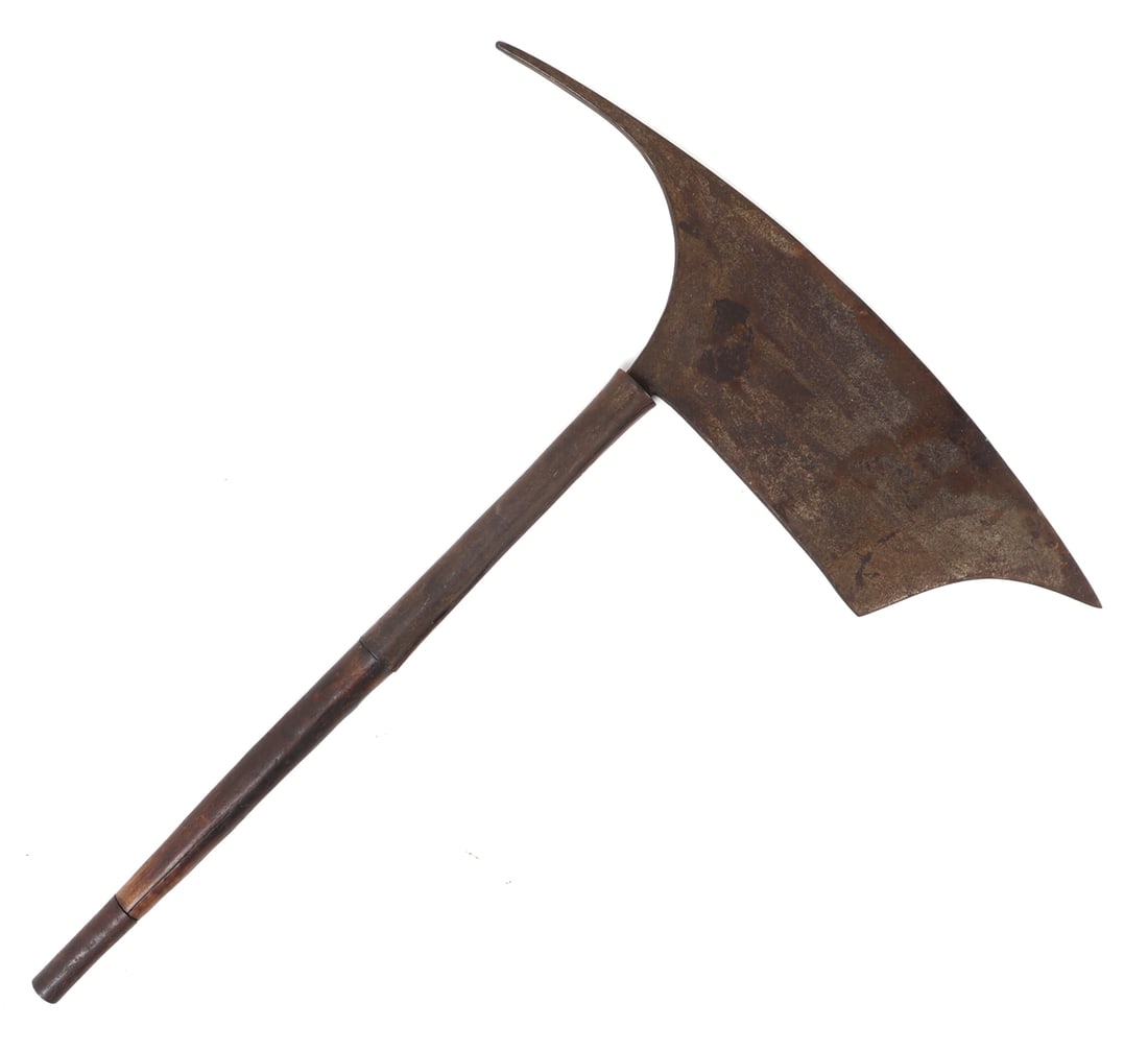 Philippine Headhunters Axe, Igorot: Philippines, Northern Luzon, Cordillera Region, pre-1930s or 19th century. Simplistic headhunters axe with a distinct curved face and rear spike affixed to a slender steel sleeved and wood shaft. 