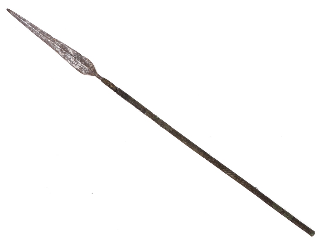 Rare Philippines Spear, 19th c.: Philippines Archipelagos, Mindanao Moro or Lumad Rare spear with elongated double edge head in tapering form and raised diamond cross section. Shaft in wood and finely wrapped in brass wire with