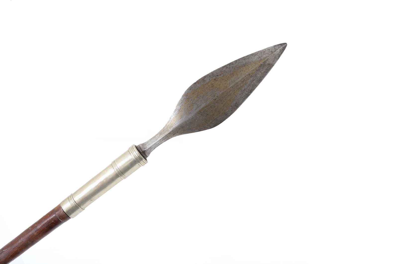 Fine Moro Tausug Spear, 19th Century: Fine Moro Tausug spear with wide double edge blade and diamond cross section. The base with tightly reduced to a silver or nickel sleeve. Original shaft with old label on spear. 88.5" tall Spear