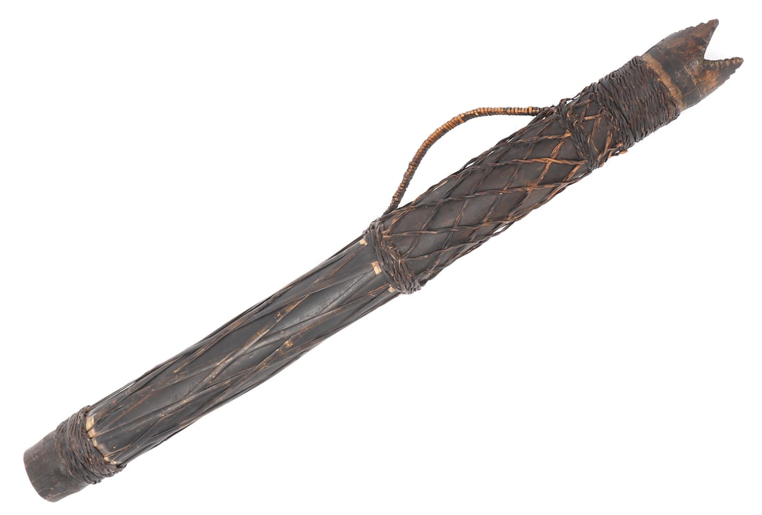 Incredible Filipino Long Arrow Quiver, 20th Century: Philippines, Ifugao bamboo quiver, intricately wrapped in rattan weave throughout. Including diamond weave, braided, and lattice banding, this particular quiver is exquisitely unique. Strong handle