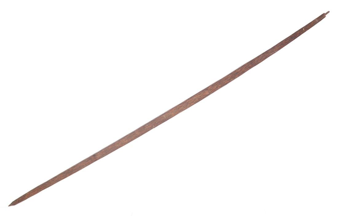 Enormous Philippines Long Bow, Circa 1885-1900: Oceania, Philippines Archipelagos, Northern Luzon. Old wood bow circa 1885-1900. Carved from a single piece of wood and four sided following a vertical grain with a pointed triangular base and cut