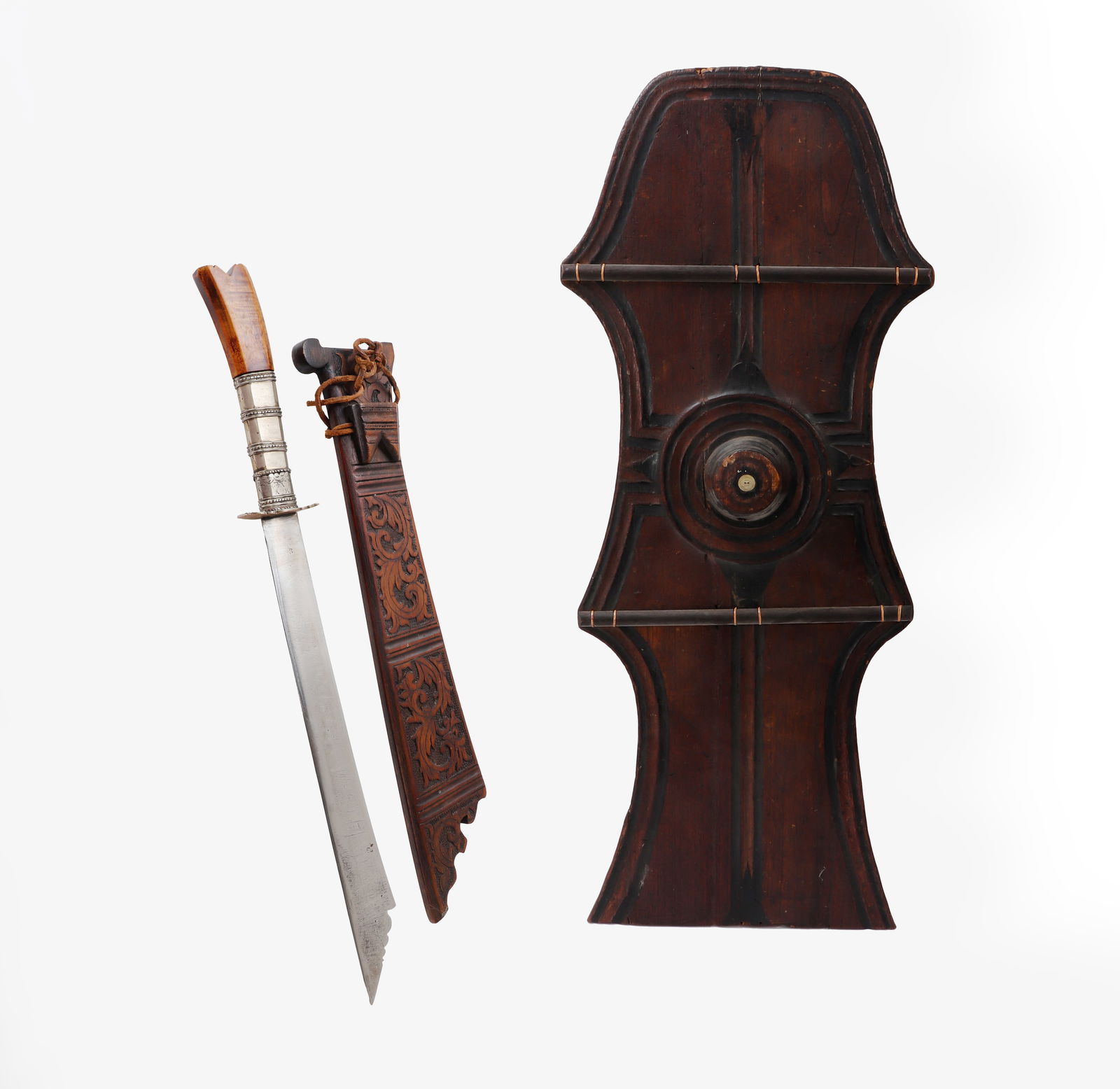 Gorgeous Authentic Lumad Bagobo Shield & Sword: Philippines, Mindanao, Lumad Bagobo Shield and sword. Kalasag form shield. Culturally rich weapons from Mindanao, Philippines distinctive for their fine carved wood, brass, horsehair, and bead decorat