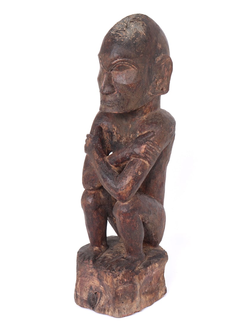 Philippines, Kankanay or Bontoc-carved Wooden House God Figure: Philippines, Kankanay or Bontoc-carved wooden house God figure (Galgalawa-en) made of solid Narra hardwood, circa 1st Quarter of 20th Century. This wooden house-god figure, known as Galgalawa-en,