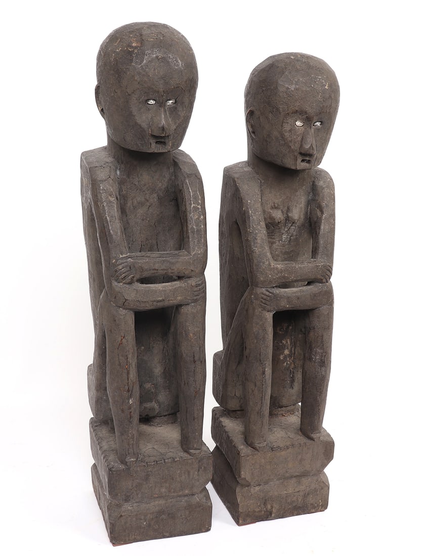 Pair Of Philippine Lagawe Village Ifugao Bulul: A pair of Philippine Lagawe Village Ifugao Bulul, made of solid Narra hardwood with blood ritual patina. The Philippine Bulul was once part of an American collector's possession, is a striking