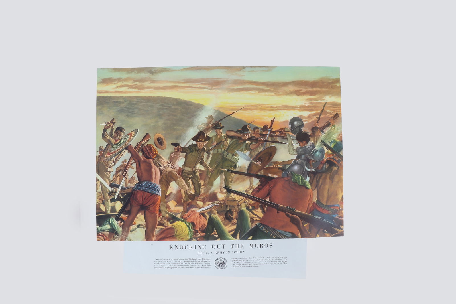 Battle of Bagsak Mountain, U.S. Army Poster Collection: Collection of five printed rolls of US Army posters each with detailed descriptions of the US Army in Action. (Knocking Out the Moros) poster with War Office crest. Detailing the four day battle of