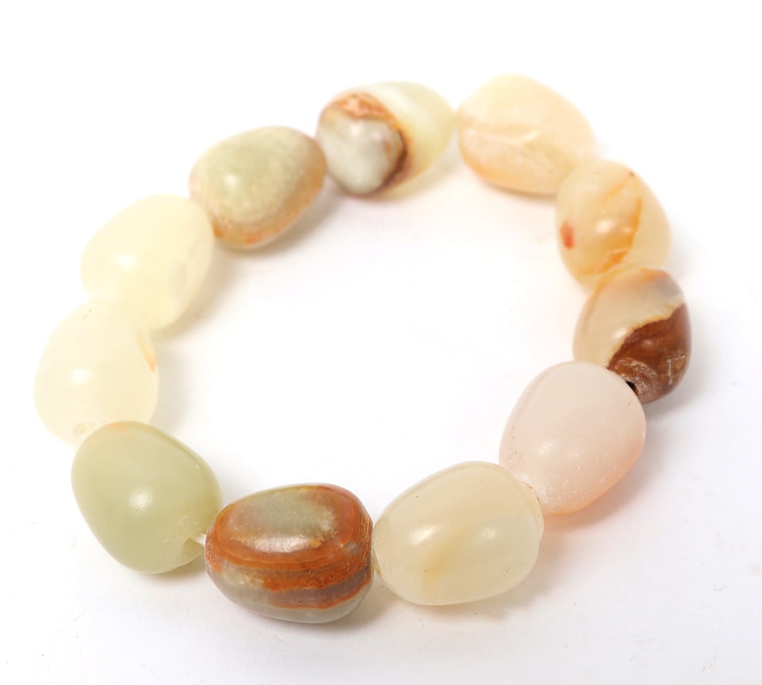 Beautiful Agate Stone Bead Bracelet: Natural agate tumbled and drilled into fine petite beads, strung on an elastic band to make this lovely bracelet. Light pink to sea green colors throughout. Size 2" W elastic band