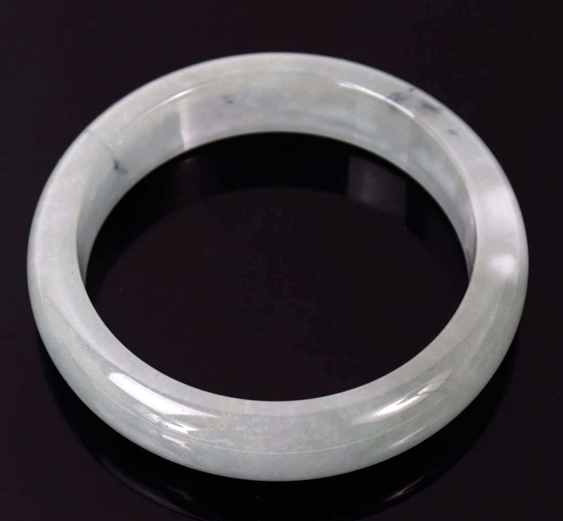 Gorgeous Rock Crystal Quartz Bangle Bracelet: Perfectly rounded, polished and smoothed, raw rock crystal quartz mineral specimen bangle bracelet. Beautiful whisp cloud like inclusions throughout in classic rock quartz form. Size 3" L x 3" W,