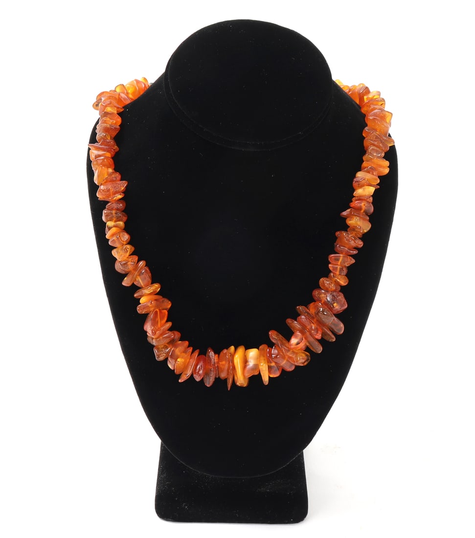 Gorgeous Chip Sead Amber Beaded Necklace: Beautiful amber chip sead beaded necklace with dozens of various sized and shaped beads, each with a lovely translucency and natural veinging throughout. Size 22" L
