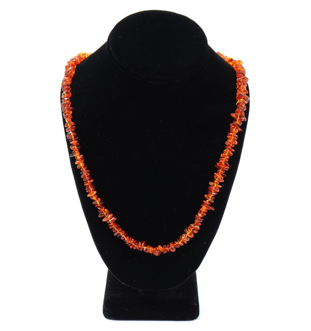 Lovely Chip Seed Amber Necklace: Fine all natural amber chip seed beaded necklace with hundreds of little chip seed beads strung together. Each in a fiery orange color with fine translucency throughout. Size 38" L