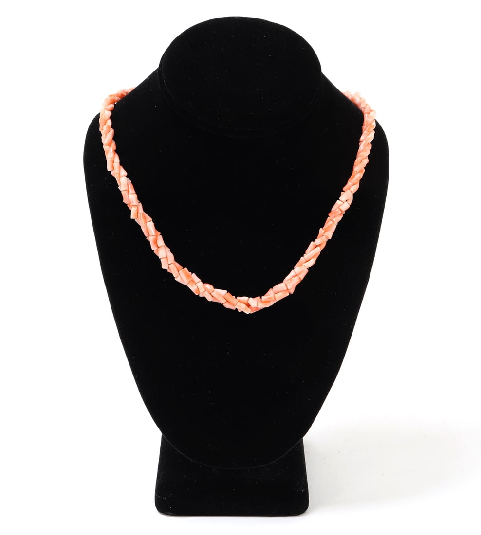 Lovely Triple Strand Rope Twist Coral Necklace: Beautiful rope twisted three strand necklace, comprised of dozens of little coral pieces perfectly polished into beads. Sterling silver clasp with shell accent beads. Size 22" L