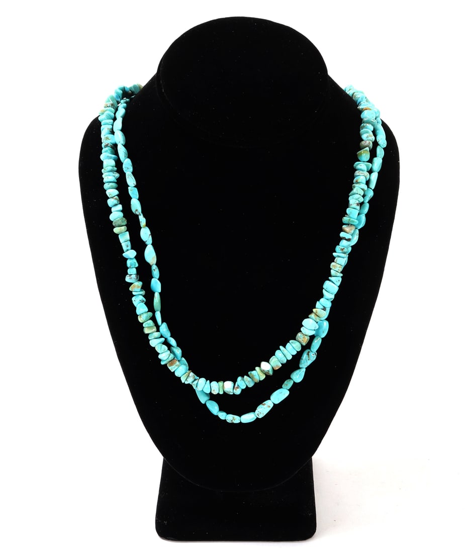 Dual Strand Raw Turquoise Necklace: Lovely dual strand raw turquoise beaded necklace with varying sizes of tumble polished turquoise beads. Sterling silver twisted rope style slit clasp. Size 30" L