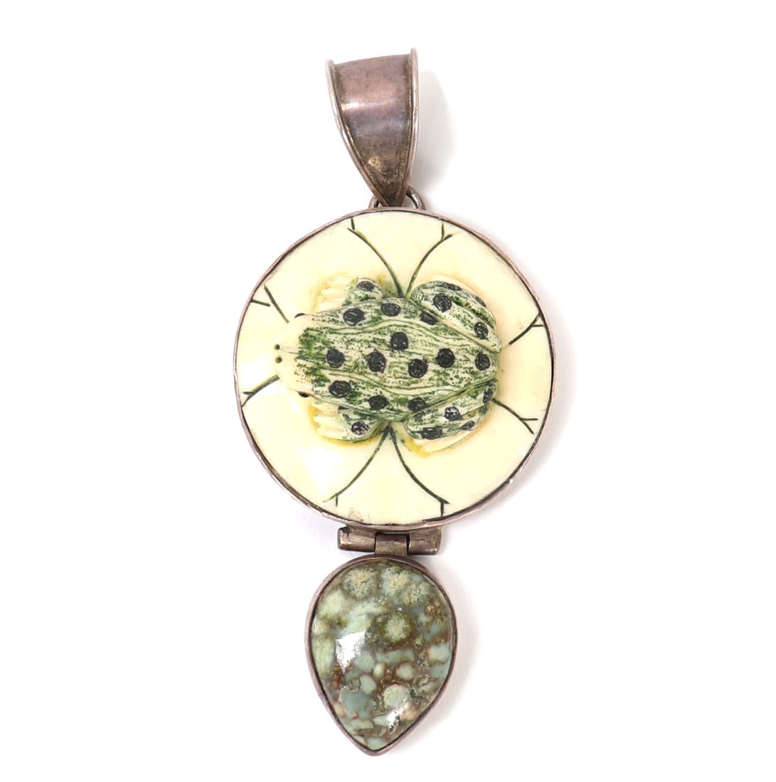 Gorgeous Sterling Silver, Bone & Turquoise Hand Made Pendant: Wonderfully detailed sterling silver, bone and turquoise pendant. Bone carving center piece includes a recumbent frog on a lily pad, painted details include green stipples and black spots. Wonderful