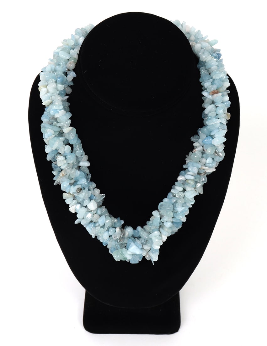 Gorgeous Multistring Natural Polished Aquamarine Choker: Hundreds of polished and drilled pieces of natural aquamarine beads compose this delicate and lovely all natural stone choker. Varying colors from sea blue, sky blue, greens, and crystal clear make