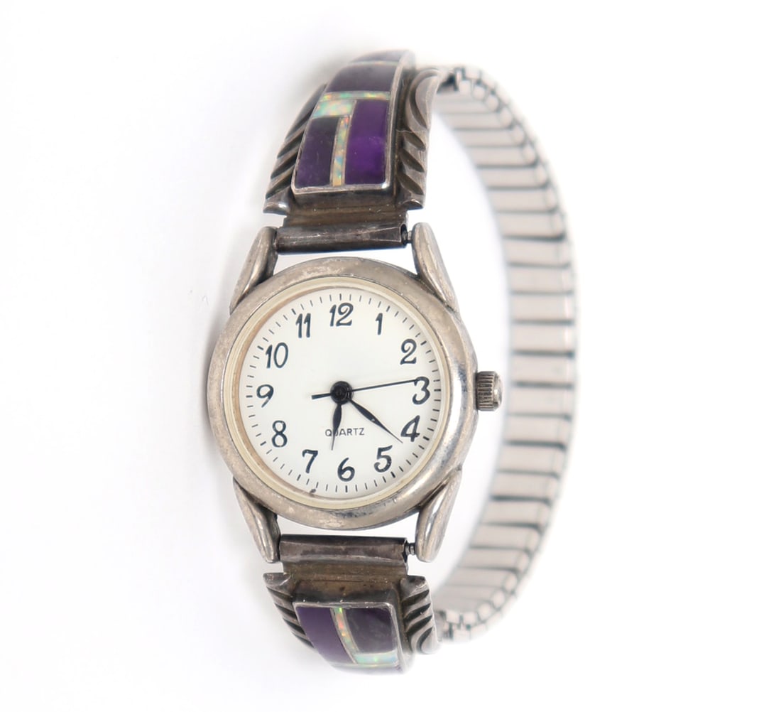 Native American Sterling Silver Watch, Initialed RD: Lovely Zuni designed watch with gorgeous opal and deep purple stone inlays. Rope twisted sterling silver, and a flexible band. Quartz mechanism watch, which did test and function properly. Size 2