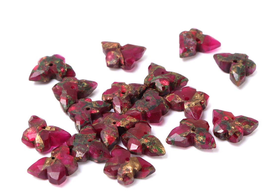Lovely Group of Raw Rubilite Butterfly Beads: Wonderful collection of raw Rubilite minerals each perfectly carved into a beautiful butterfly in flight with wings wide and outstretched. Each bead uniquely beautiful with incredible gold, green and