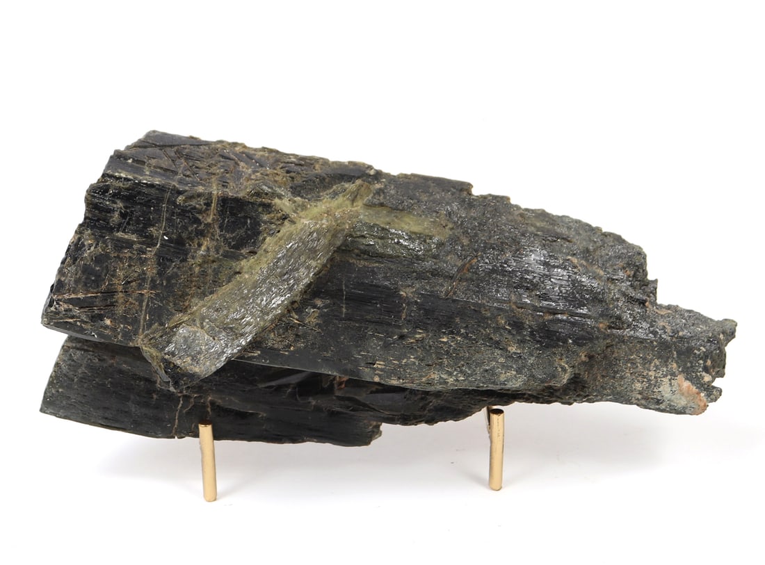 Wonderful Section of Raw Black Tourmaline: Large section of black tourmaline with a deeply striated surface with a glossy radiance. Black tourmaline helps to protect against negativity and when placed in the four corners of a room, creates a