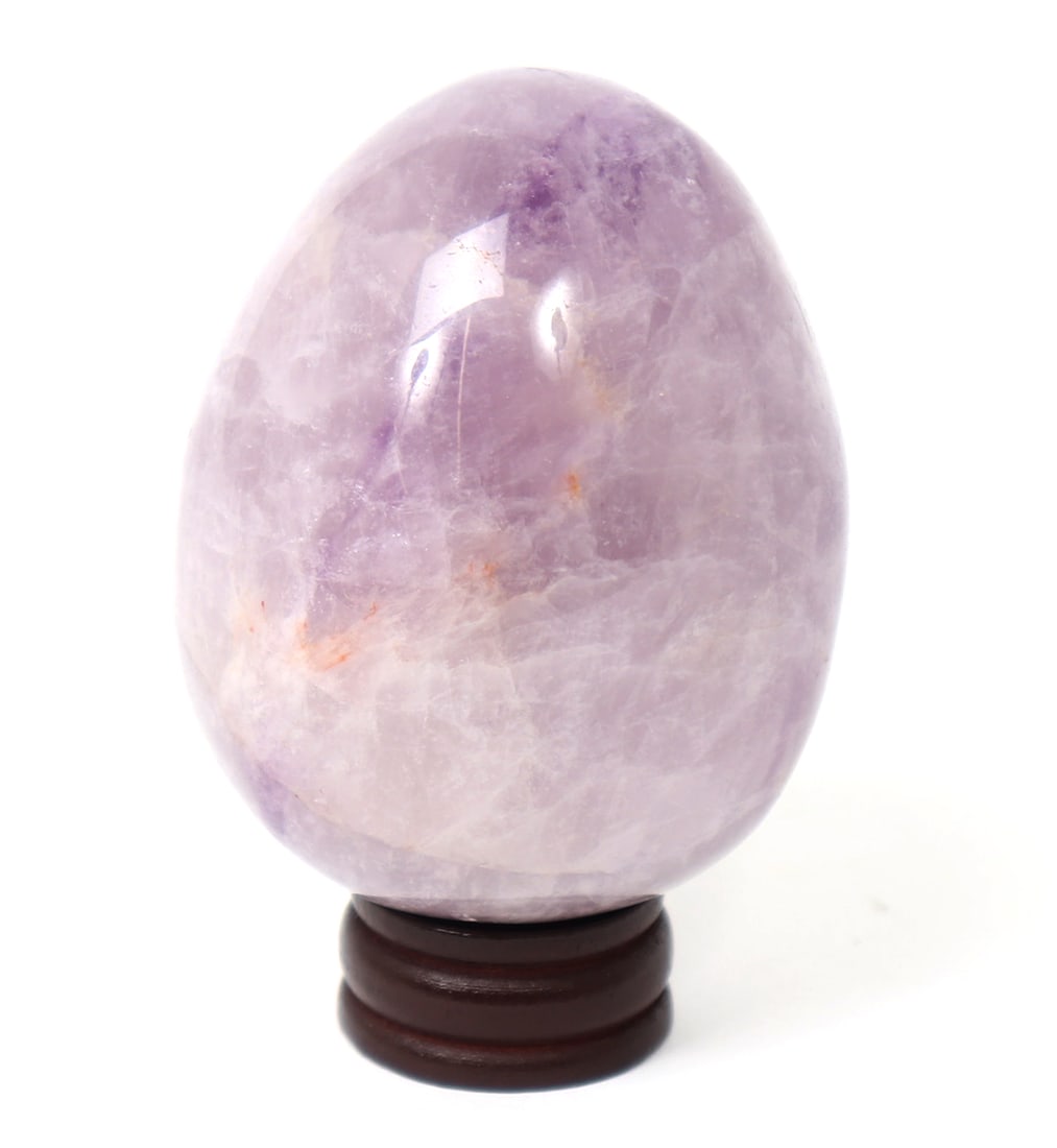 Lovely Egg Shaped Amethyst Mineral Specimen: Perfectly egg shaped and polished section of an amethyst, with beautiful lavender and deep purples throughout. Size 3 1/8" H with stand