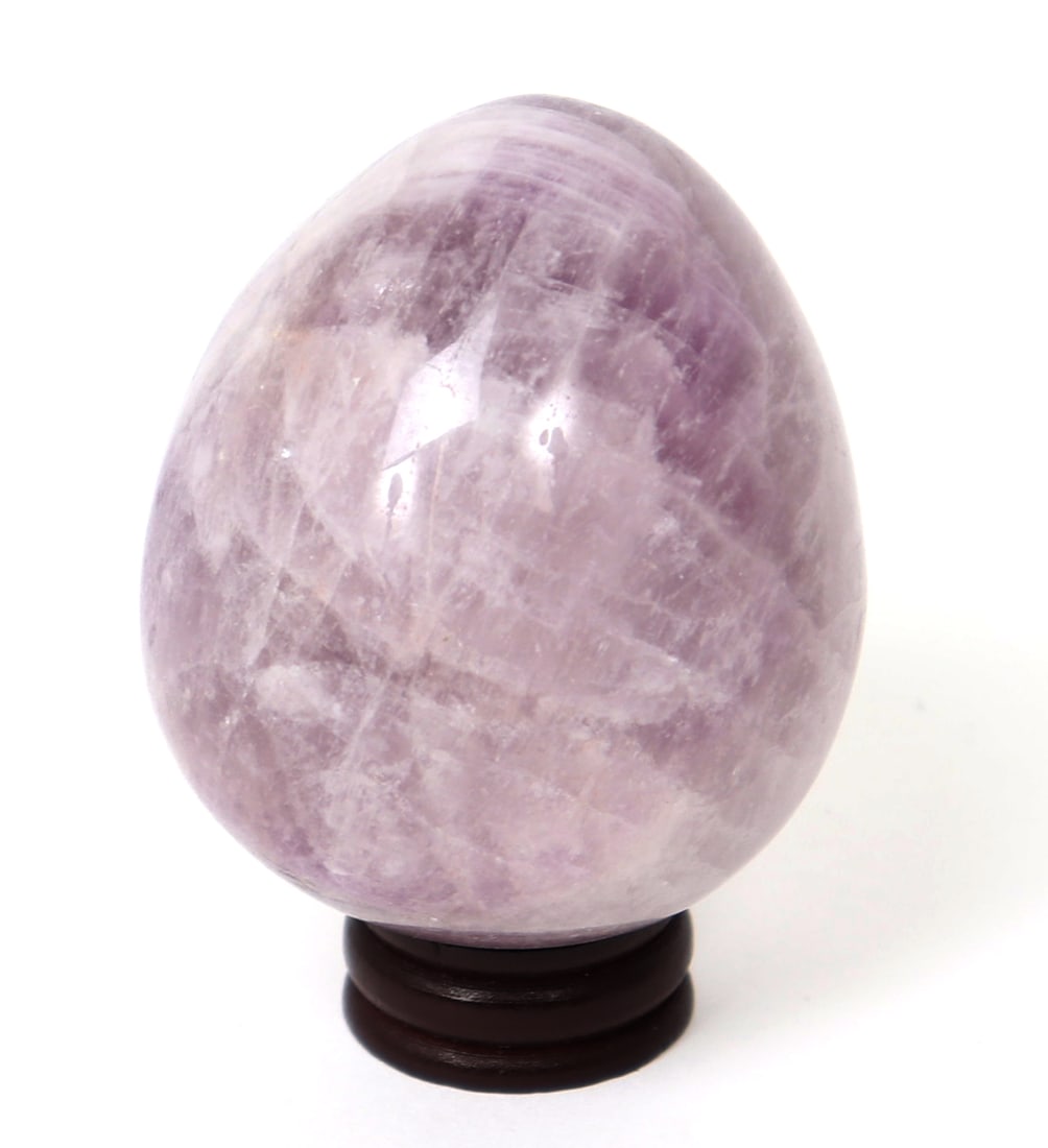 Fine Polished Amethyst Mineral Specimen, Egg Shaped: Perfectly egg shaped and polished section of an amethyst, with beautiful lavender and deep purples throughout. Size 3 1/8" H with stand