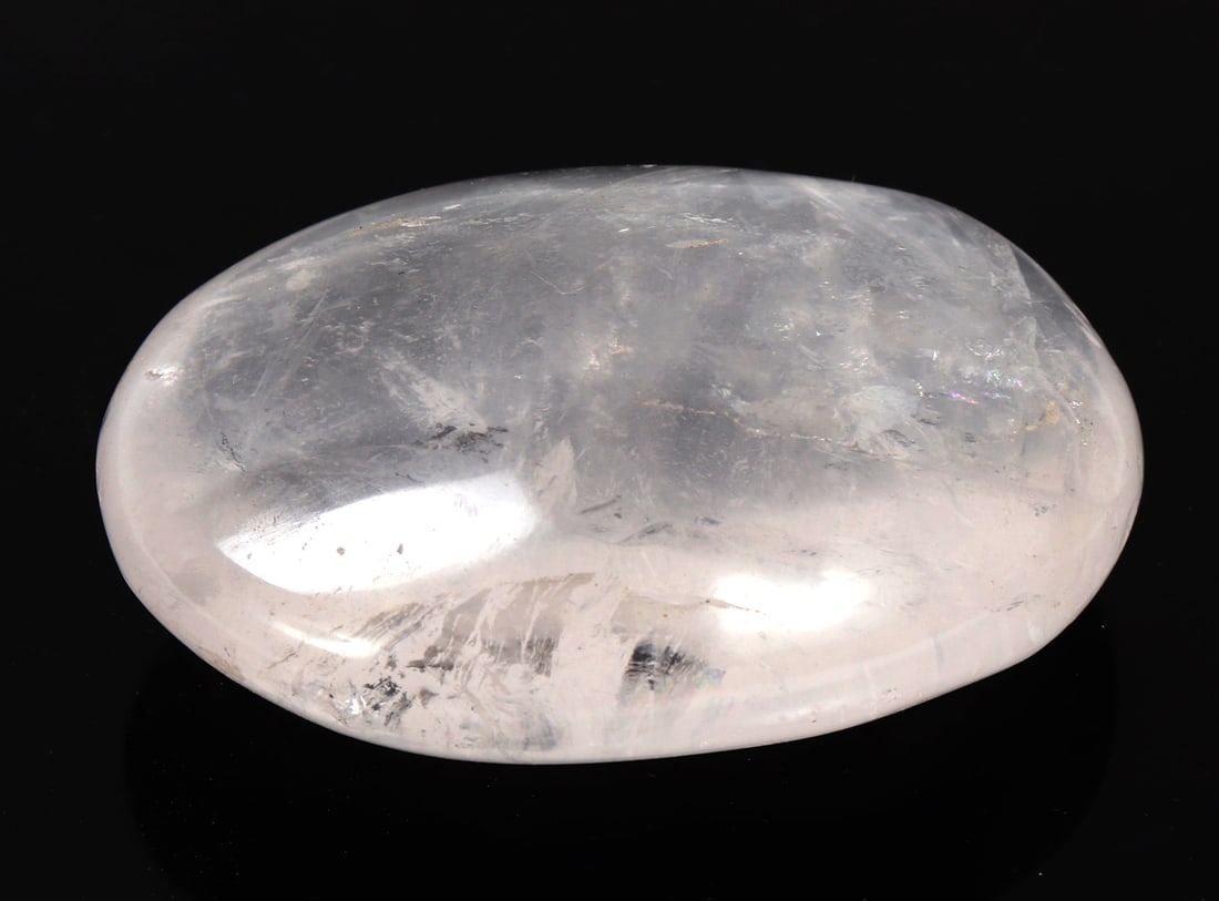 Smooth Polished Palm Quartz Mineral Specimen: Beautiful rock crystal quartz mineral specimen in a perfect palm size. Often used to enhance clarity, balance energy, and promote overall well-being, this particular piece could easily be used for