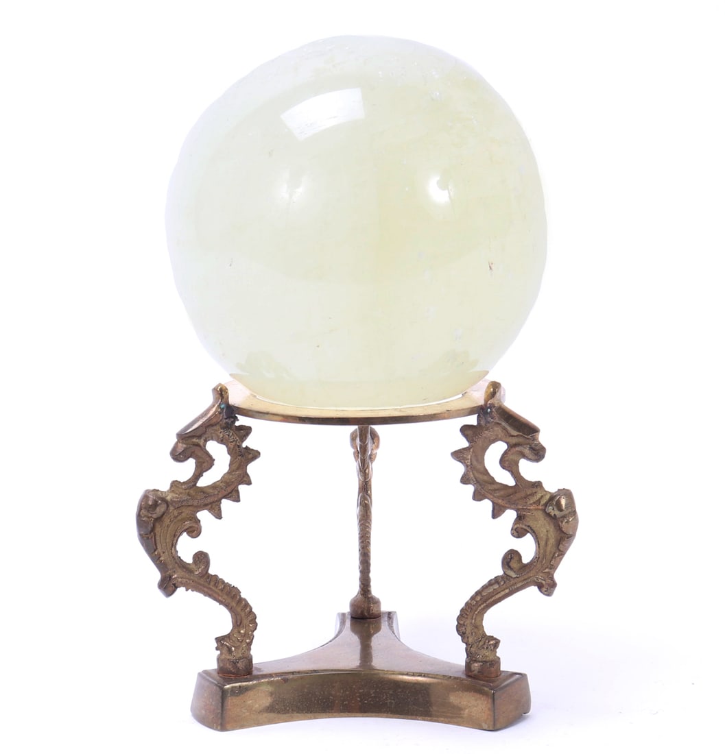 Gorgeous Rock Crystal Quartz Sphere on Custom Stand: Beautiful all natural rock crystal quartz mineral specimen proudly displayed on a custom brass dragon stand. Three arched and intimidating dragons act as columns with a circular base for holding the