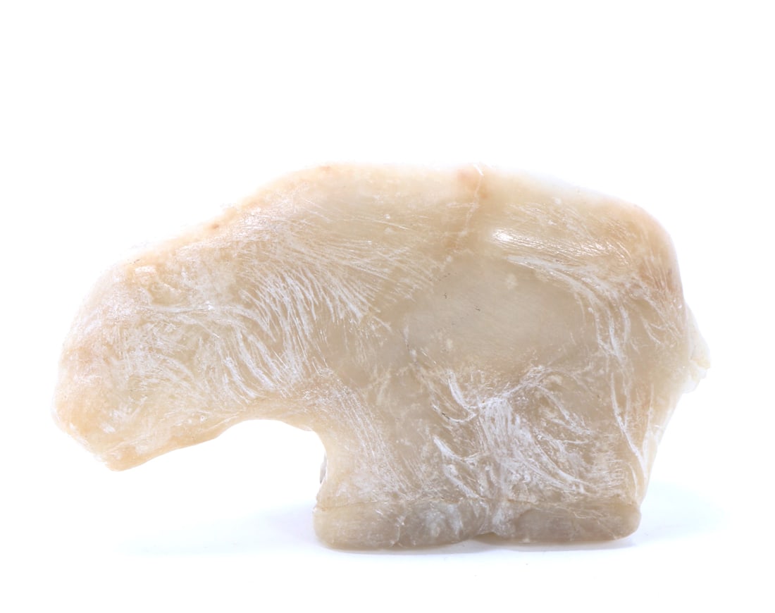 Rock Crystal Carved Bear Figurine: Adorable rock crystal, also known as white onyx, carved polar bear figurine. Minimalistic style with incising to the body as well as some high relief details to the face. Size 5 1/2" L