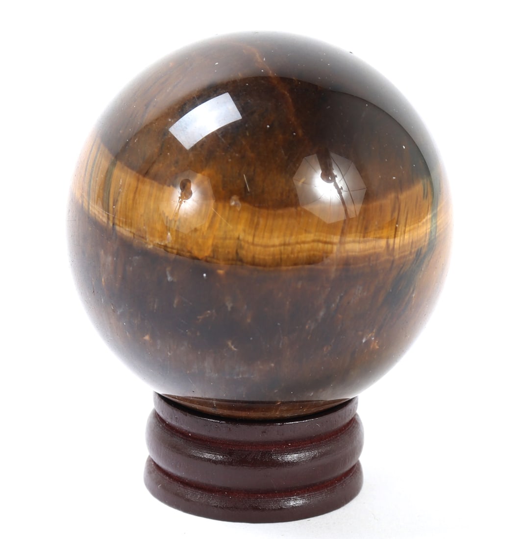 Gorgeous All Natural Tiger's Eye Mineral Specimen: Fine all natural polished sphere of tiger's eye mineral specimen with gorgeous golden veining throughout creating the illusion of a cats pupil. Size 2" W, 2 1/4" H on included stand, Weight 164 g,