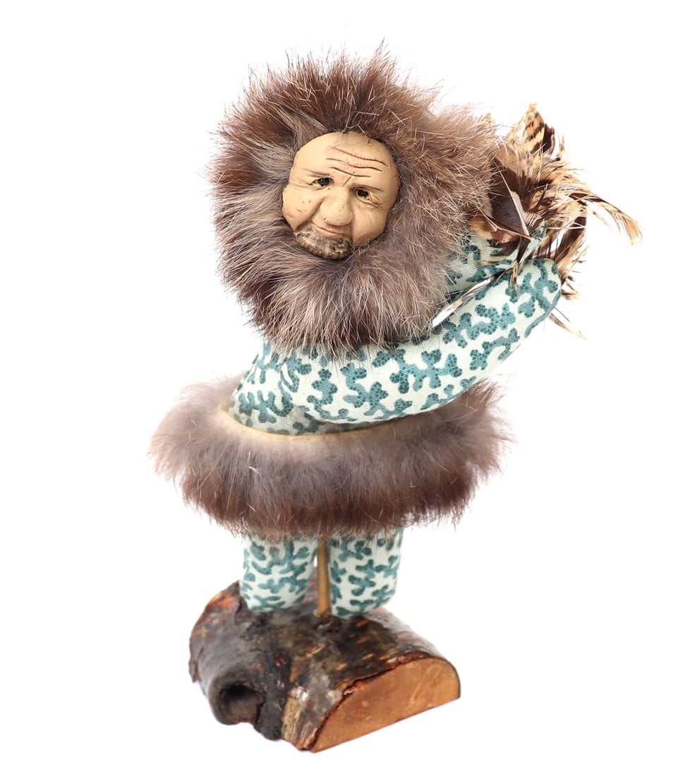 1994 Jerri Fors Male Fan Dancer: Nicely detailed male fan dancer statue, comprised of wood and clay. Made by Jerri Fors and dated 1994, this is one of the "Reflection on Alaska" series and depicts a male standing with feathers