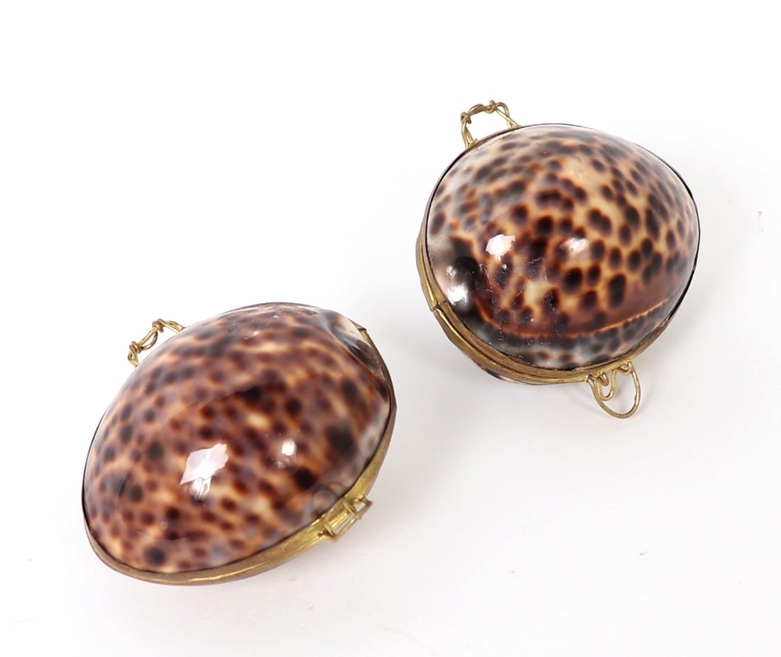 Pair of Sea Shell Vintage Snuff Boxes: Vintage sea shell snuff boxes or carriers with copper and gilt clasps for securing snuff inside. Size 2" W each approximately