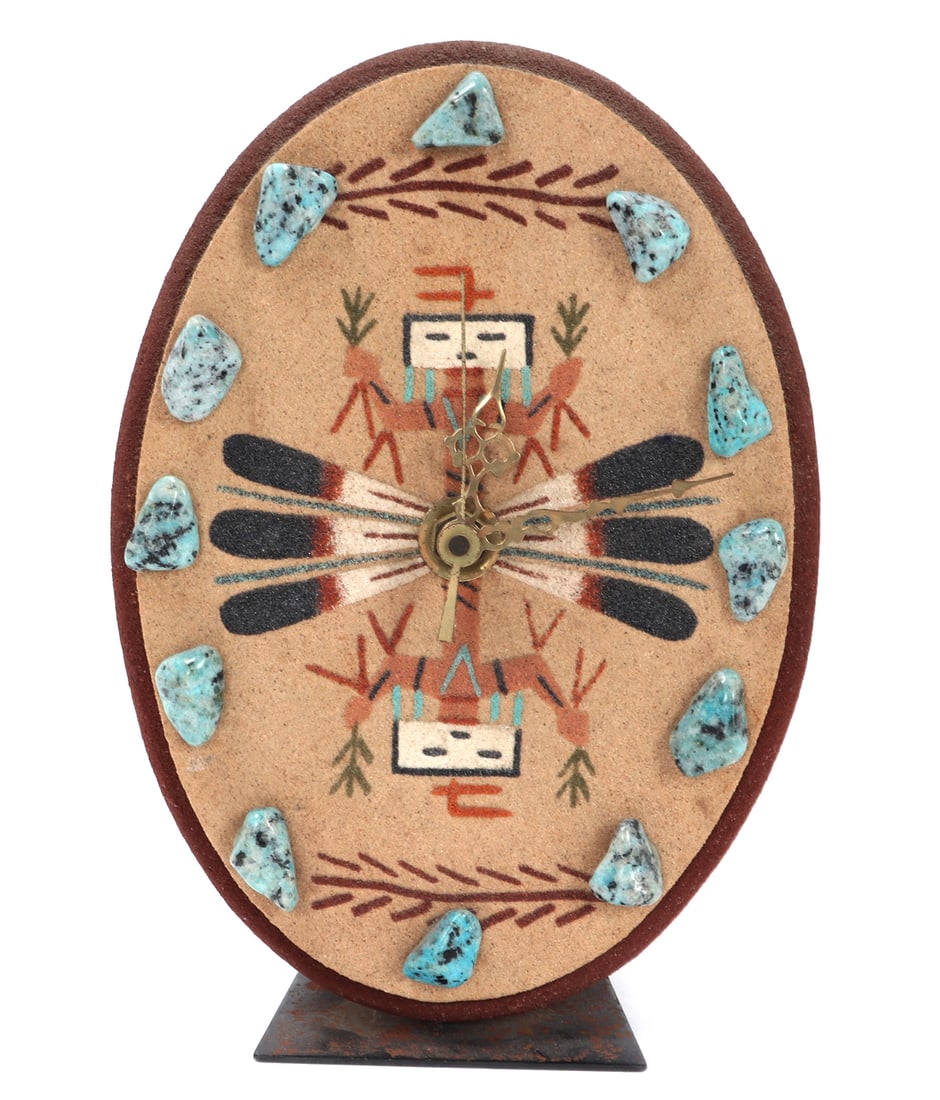Beautiful Native American Style Desk Clock: Native American style turquoise clock with raw turquoise nuggets indicating the hours throughout the day. Painted in beautiful bright orange, red, white and black coloring throughout. Size 8" H x 5" W