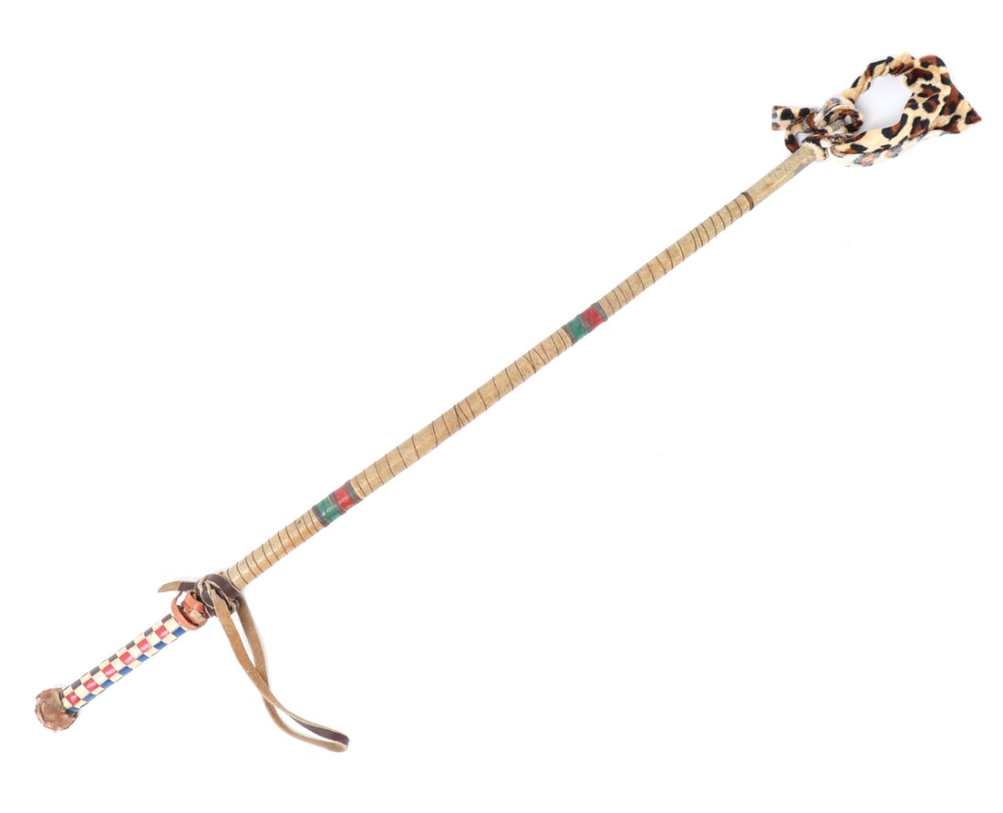 Gentleman's Horse Whip, circa 1920's: Nice 1920's gentleman's whip, handle is wrapped in leather with red and blue checkered detailing. The shaft appears to be made from a durable material, possibly cane, and is embellished with colorful