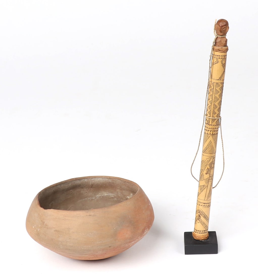 Small Squat Pre-Columbian Terracotta Bowl & Bamboo staff: Small squat pre-Columbian terracotta bowl, with slightly rounded but stable base. Bamboo staff intricately carved and incised in geometric banding and designs. Wood figure seated on top, with fiber