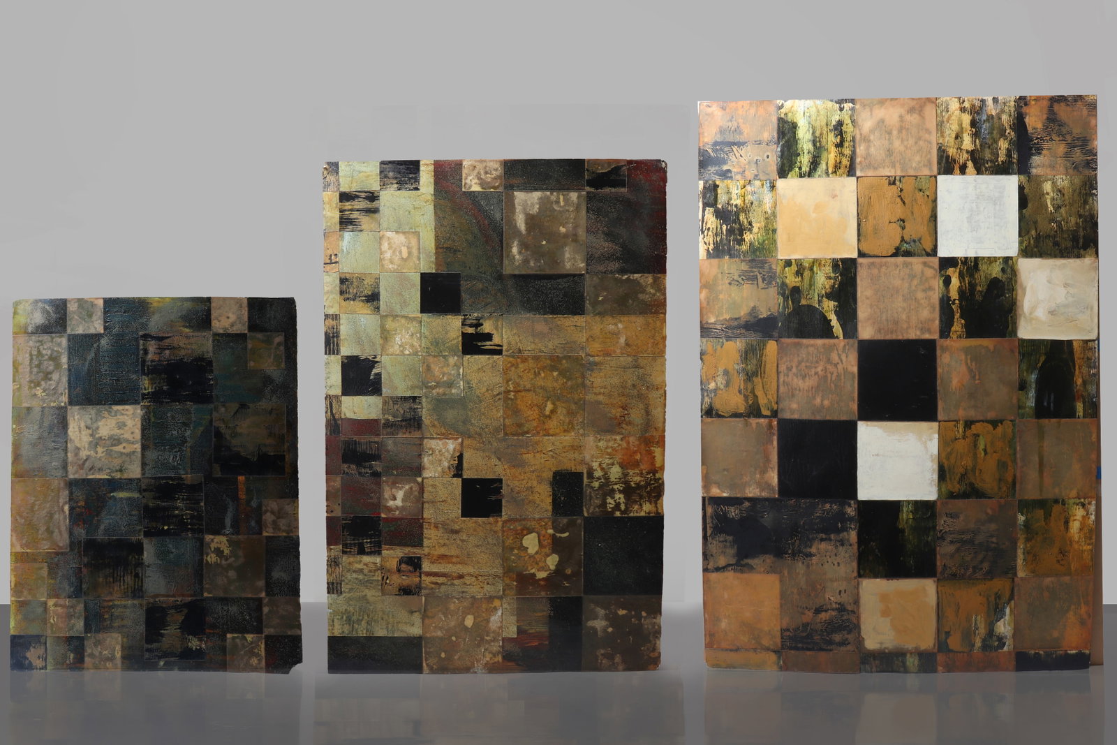 SET OF THREE ABSTRACT ACRYLIC PAINTINGS ON PAPER BY JEFF LONG: American, contemporary A visually cohesive group of three unframed acrylic paintings on paper by Jeff Long, each composed in the artist?s characteristic rectilinear language of layered grids, tonal bl