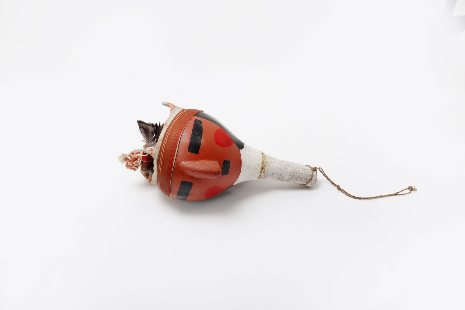 Edmund Nequatewa Hopi Kachina Rattle: Hopi, Shungopavi Village, Arizona, mid to late 20th century American Southwest, Hopi peoples 20th century. Painted gourd rattle by Eddie Nequatewa, of tapering form with elongated handle, decorated