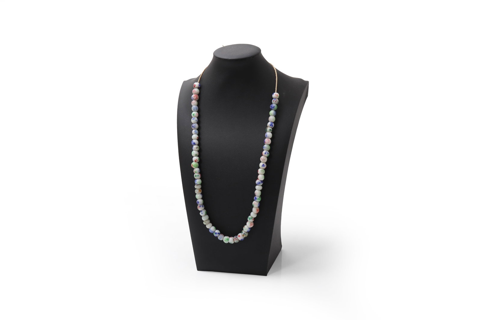 Antique Chinese Trade Bead Necklace: China, 19th to early 20th century or earlier Long necklace composed of rounded glass trade beads on a pale ground, each decorated with scattered polychrome spots in blue, green, and red. The simple