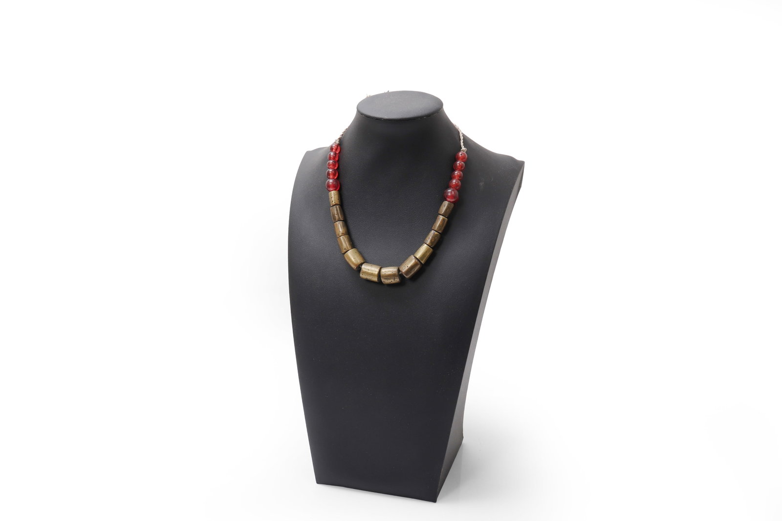 Philippine Bullet & Amber Bead Necklace, WWII: Philippine Bullet Beads with amber beads. Necklace composed of translucent amber beads alternating with larger cylindrica beads fashioned from bullets from WWII, creating a bold and graphic contrast. 