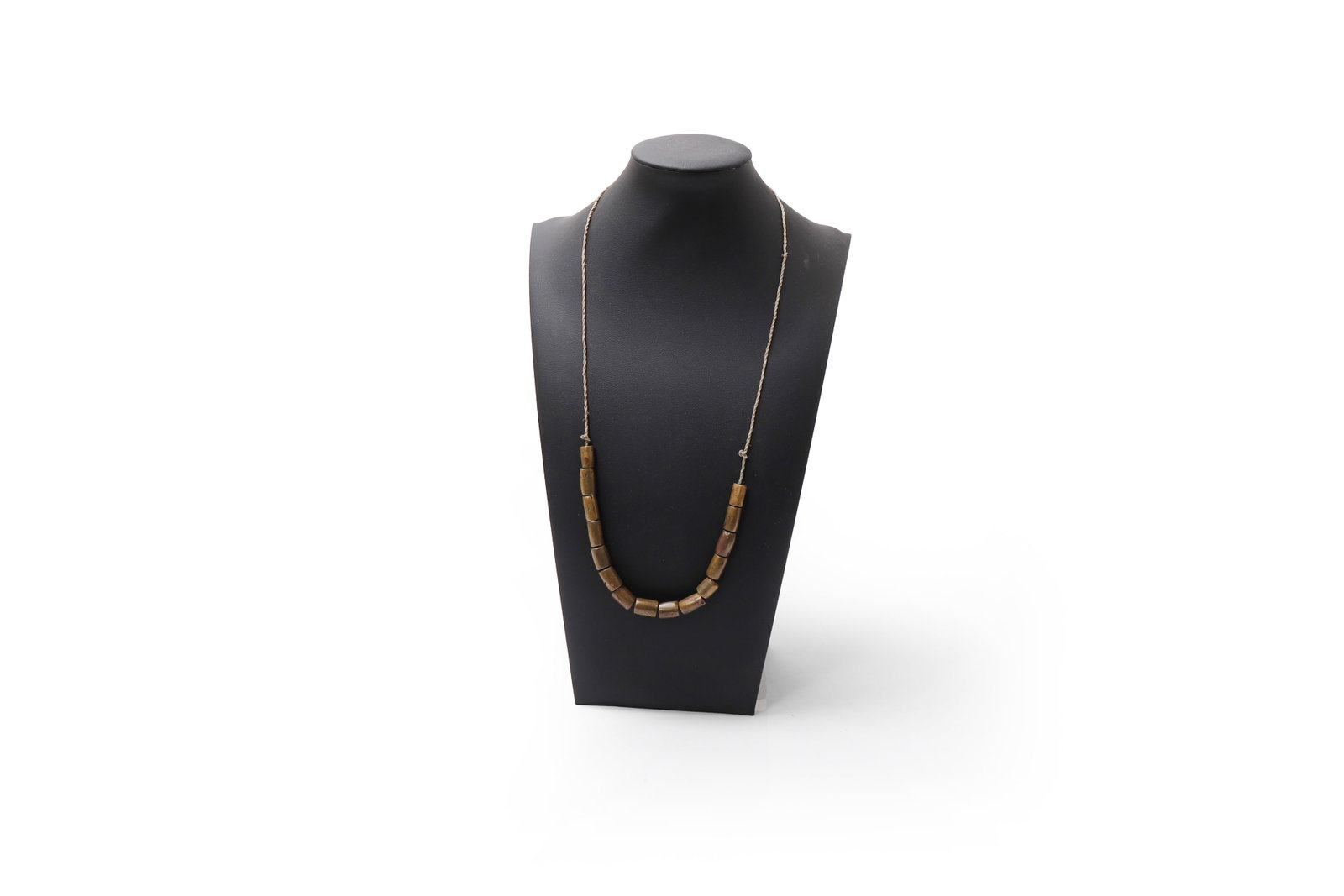 Philippine Bullet bead necklace: Philippines, 20th century Philippine tribal necklace constructed of bullet shell casings from WWII. Necklace composed of a small number of cylindrical bullet beads suspended on cord, the restrained ar