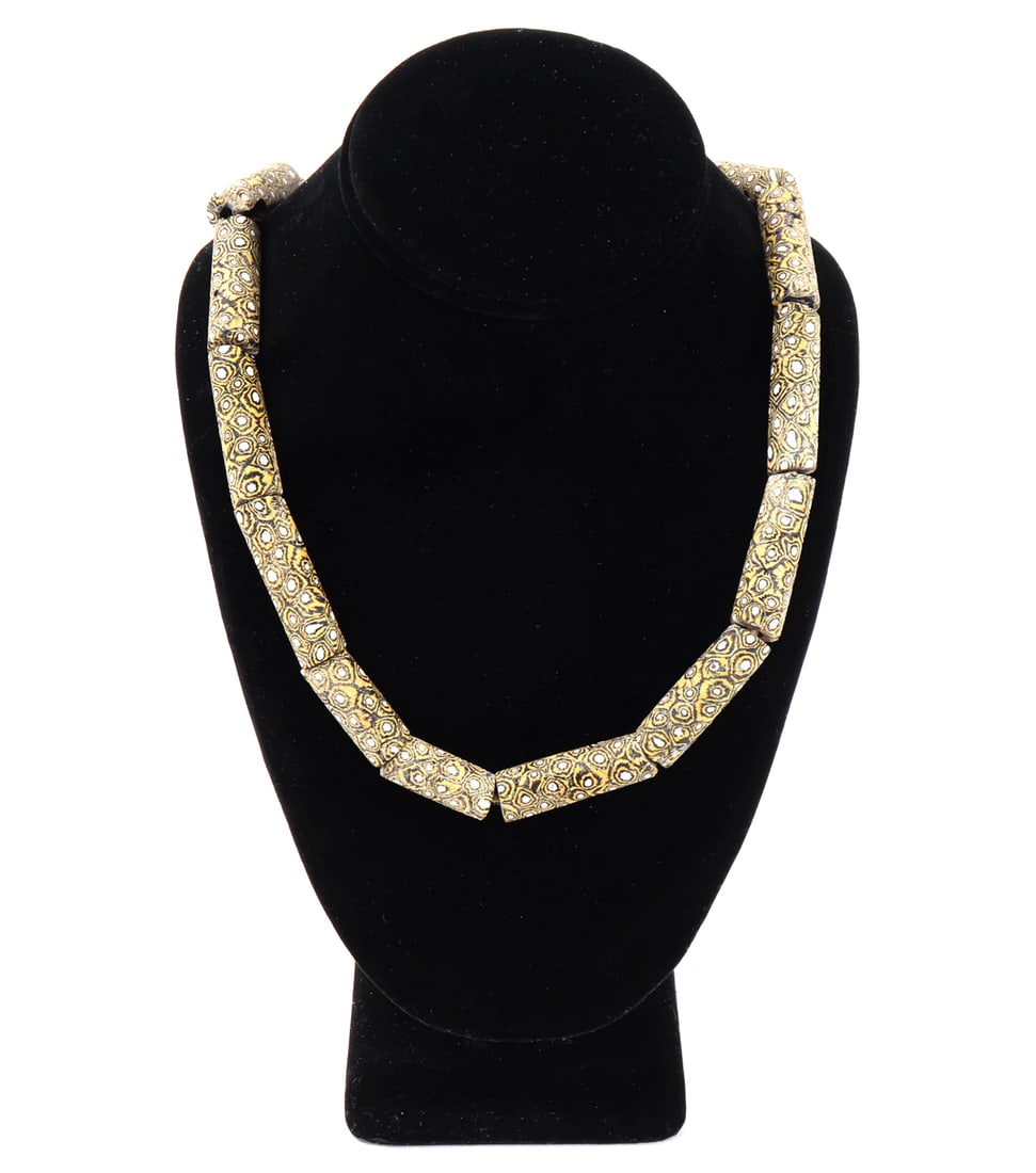Lovely Heavy Strand of African Trade Beads: Bright yellow hand crafted strand of African trade beads with beautiful detailing throughout in black and white emphasizing the yellow color throughout. Size 30 1/2" L, bead 1 1/2" L Family