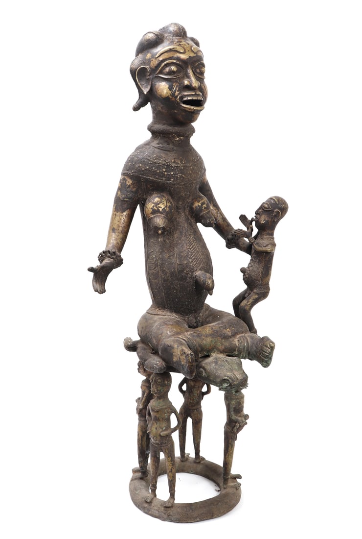 Massive Tikar Bronze Sculpture, Nearly 100lbs: African, Cameroon, Tikar or Bamileke bronze near life-size depiction of a queen or maternity figure with children. The female figure supported by four children and one at her left hand. Varying tones