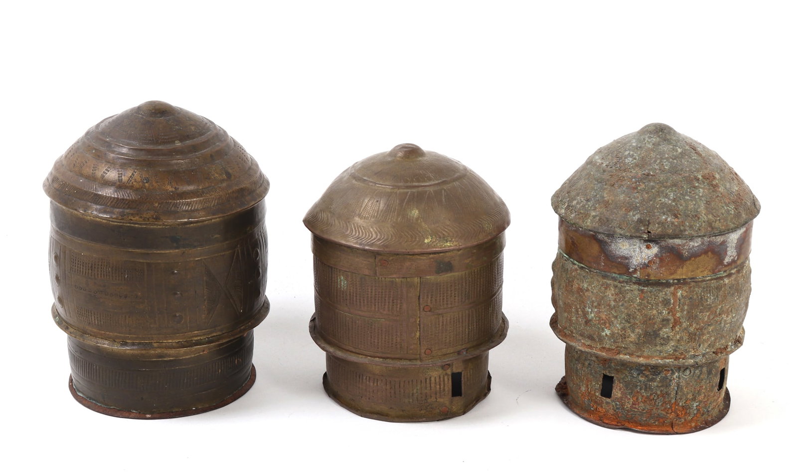 Ashanti Gold Dust Container(s): Three Ashanti Gold Dust Containers from the 19th century, crafted by the skilled artisans of the Ashanti people in Ghana. Each container is crafted in brass with intricate geometric and linear