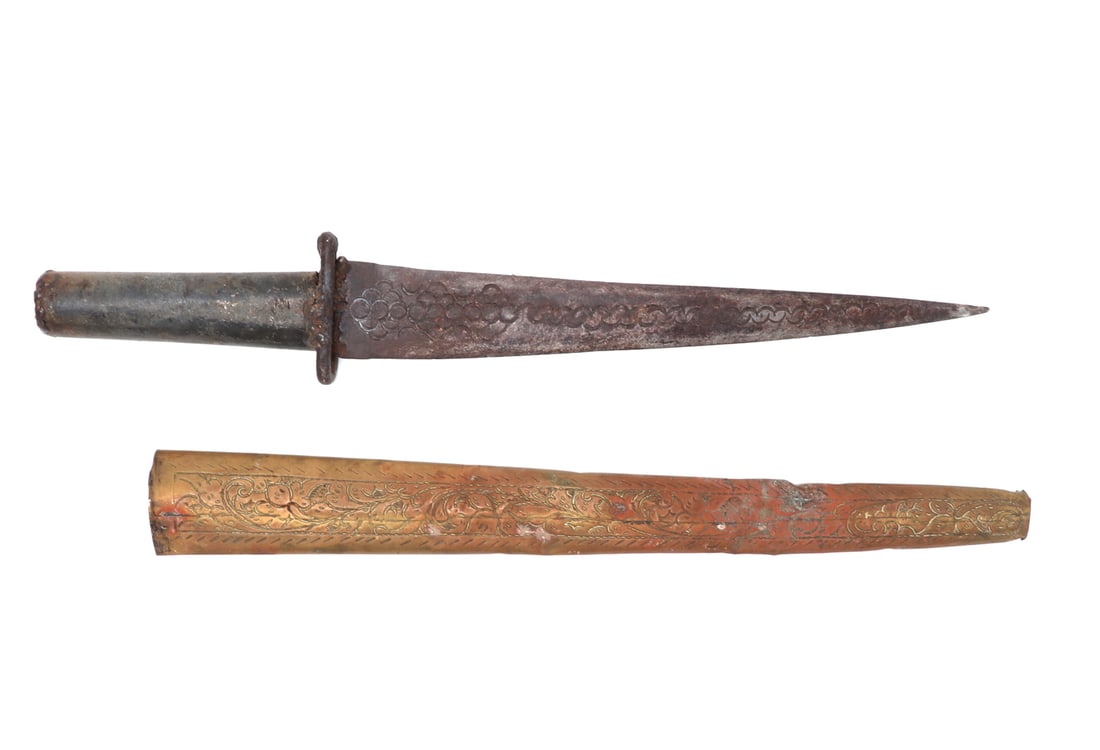 Indonesian Dagger with Brass Scabbard: Indonesia or Southeast Asia, likely early 20th century, iron or steel dagger with a long triangular tapering blade, the surface decorated with punched and incised circular and wave motifs. The hilt is