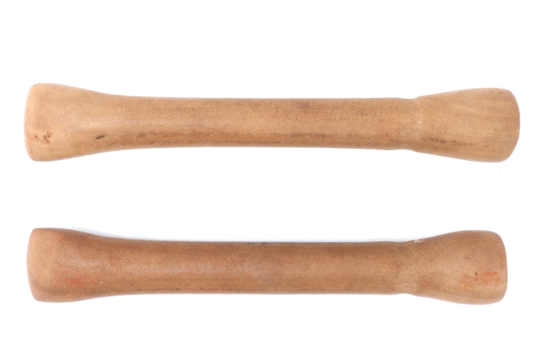 Pair of Fine Grained Stone Pestle, Africa: Each carved from a very fine grained tan or light brown stone with patinated surface and flat bulbous ends and one pointed flat end. Probably sandstone. Size 14 7/8" L, Weight 3 lb. 3.2 oz