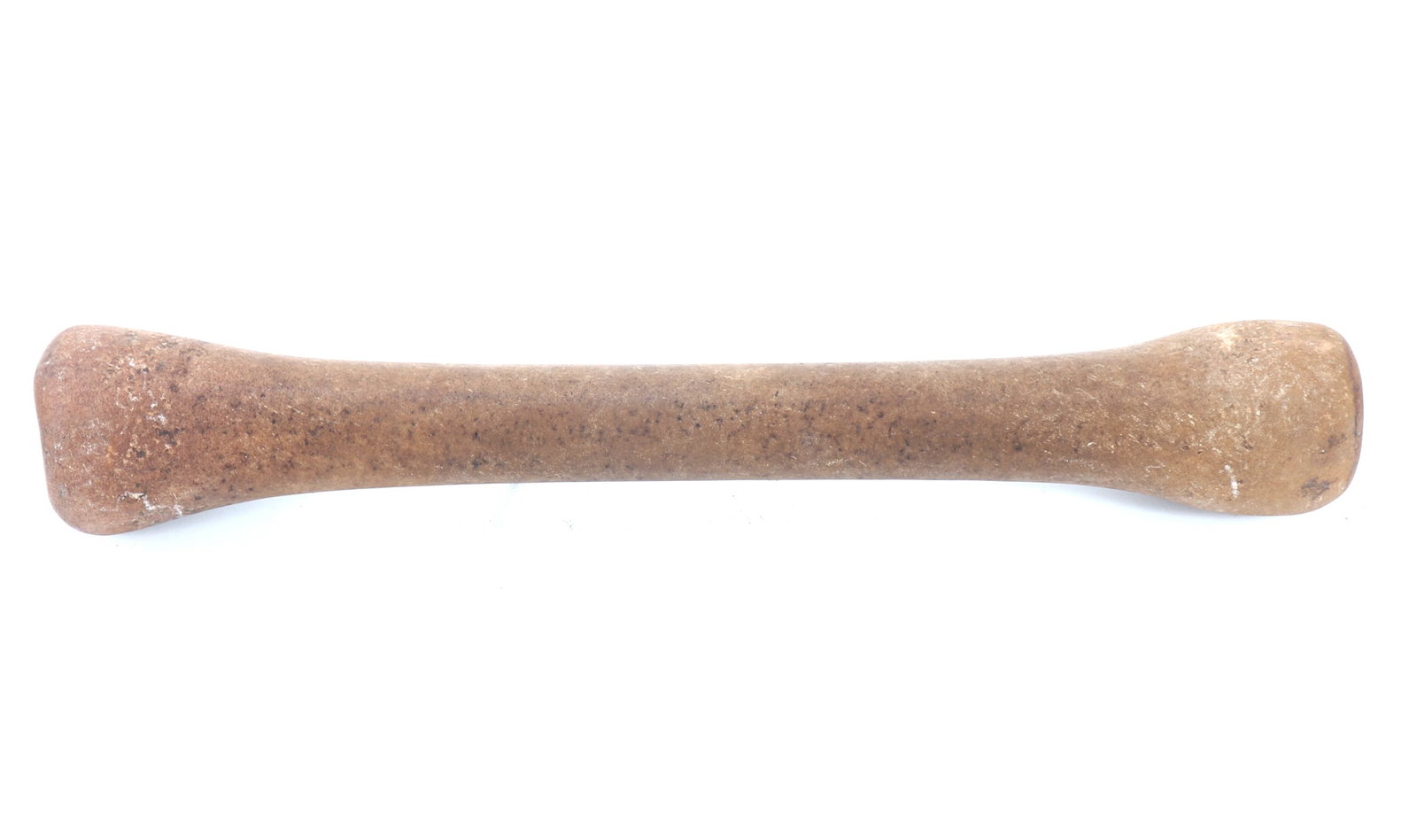 African Stone Pestle, Mali: A primitive ancient sandstone pestle, likely originating from the Tellem peoples of the Dogon region in Mali. Carved from exceptionally fine-grained sandstone, this tool features a smooth, well-worn s