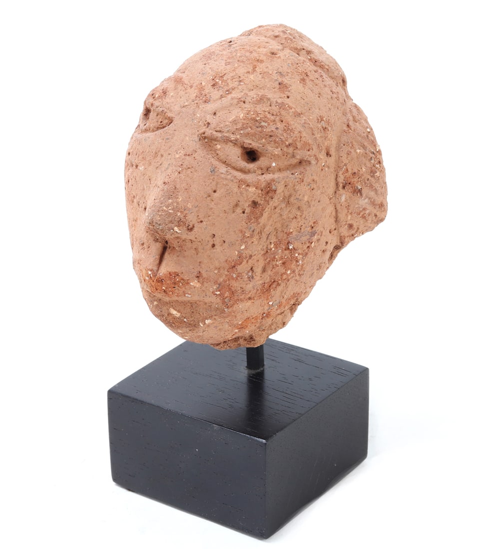 Nok Terracotta Head, 500 BCE - 200 CE: Nok Terracotta Head from 500 BCE to 200 CE, showcasing the artistry of one of Africa's earliest civilizations. This sculptural fragment exemplifies Nok craftsmanship, with its skillfully shaped featur
