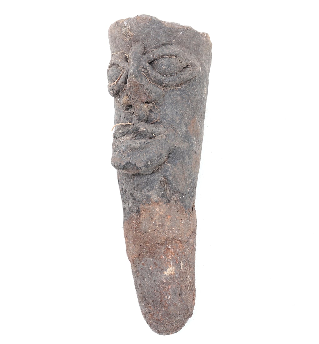 African Terracotta Head, Koma People: West Africa, North Ghana, Koma peoples 12th - 16th century. Well formed elongated head from the Koma culture with characteristic wide open eyes and full lips. Size 5 1/8" H, Weight 287 g Ex-USA