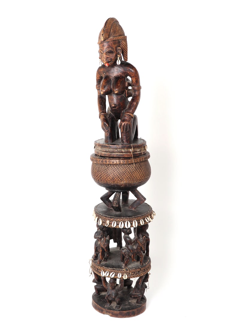 Massive Bambara Bowl Statue, Mali: West Africa, Mali, Massive Bambara bowl statue carved in wood. Top section a large and well patinated nude kneeling woman carrying a monkey. She is wearing cowrie shell earrings and colored nose