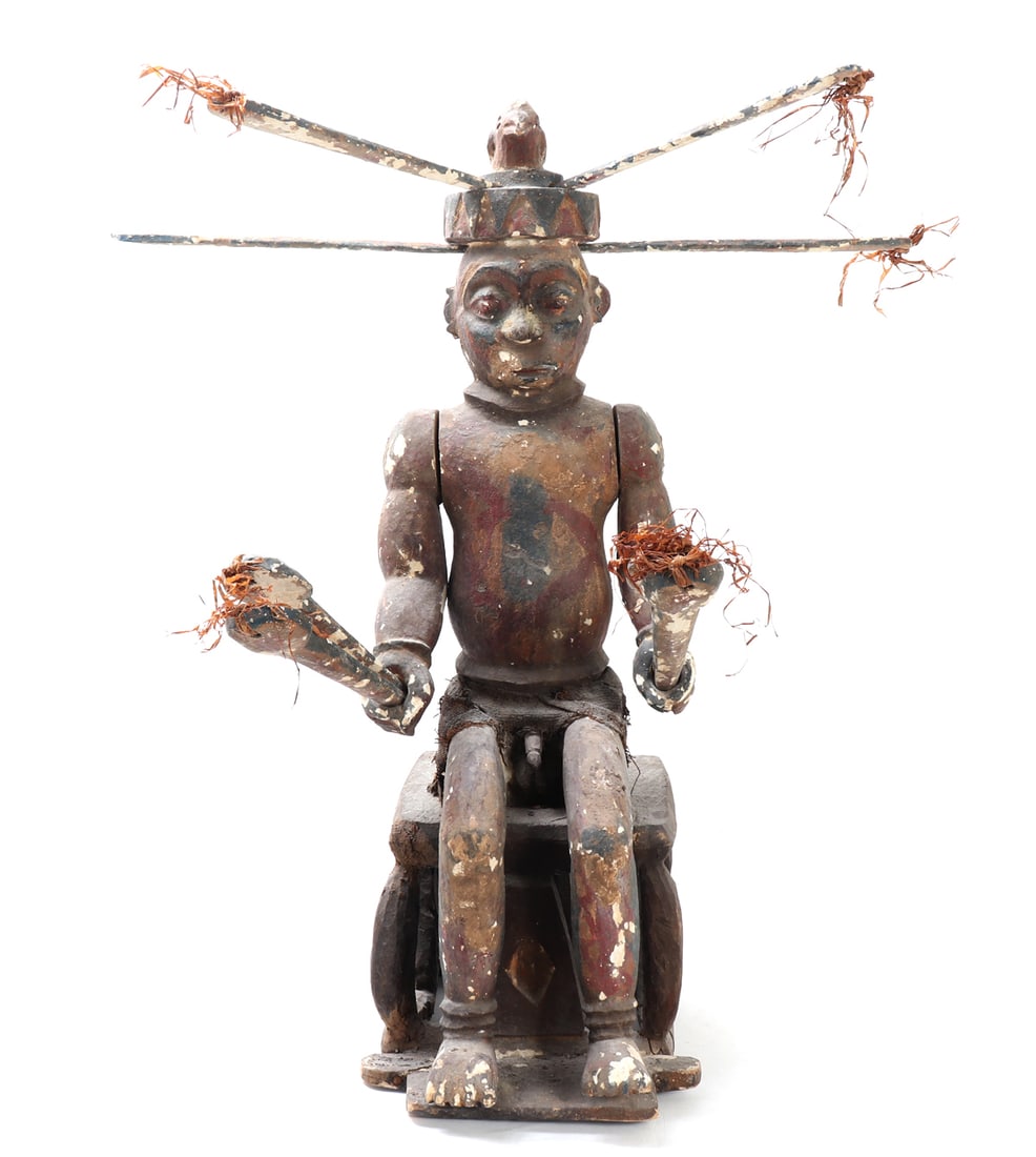 Massive African Nigerian Wood Alter Figure: Second quarter of the twentieth century, Benue Valley of Nigeria. A massive 3 foot carved wooden alter figure decorated in polychrome with articulating arms holding ceremonial wands. The facial
