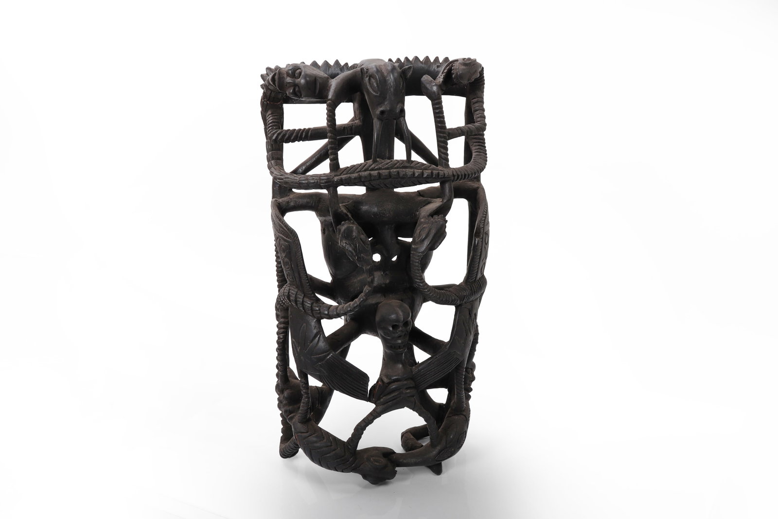 African Ujamaa Tree of Life Carving: African Tree of Life carving or Ujamma, Makonde peoples 20th century. Finely carved openwork wooden sculpture of vertical cylindrical form, intricately composed with interlacing serpents and human