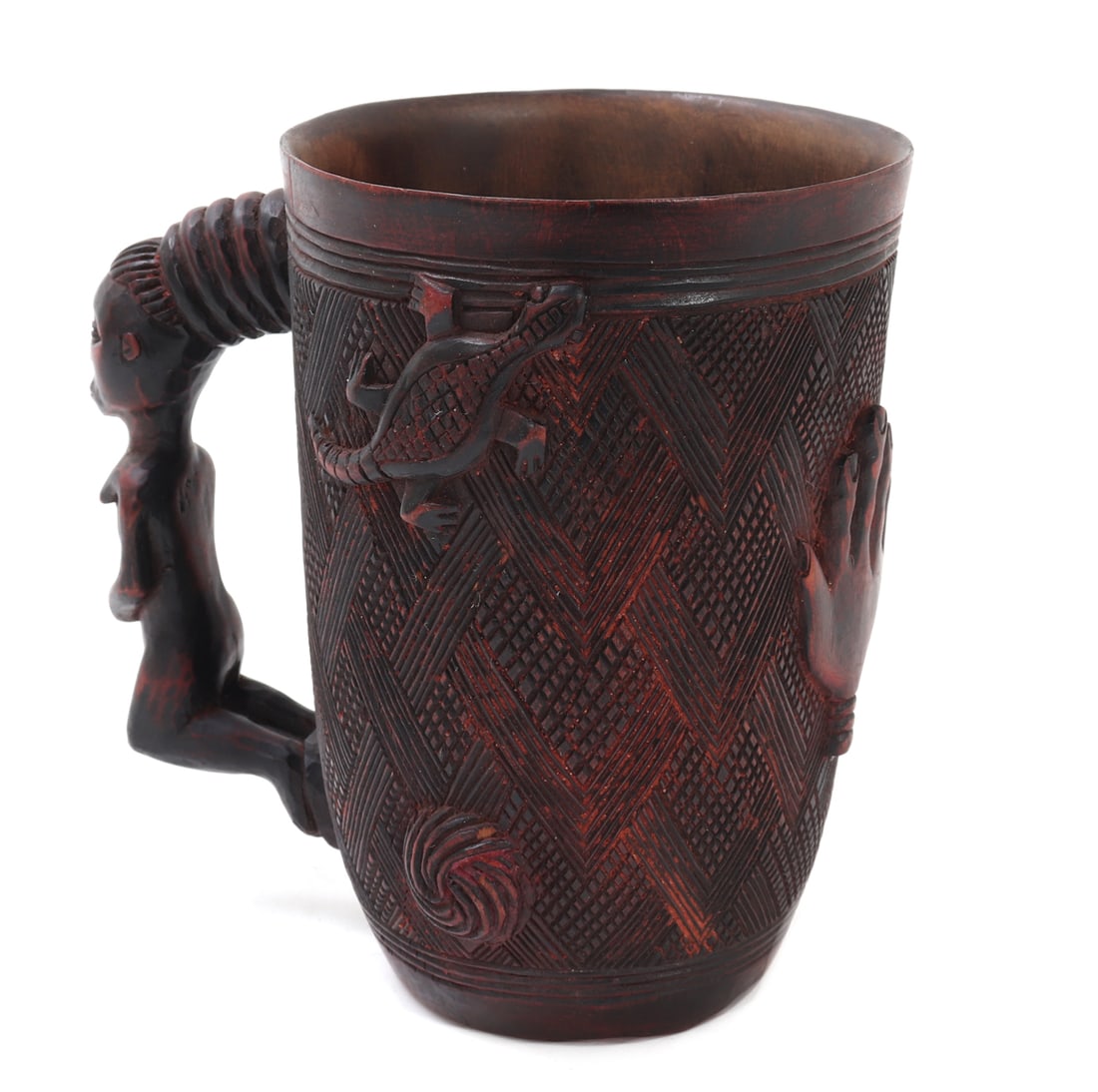 Fine Intricately Carved Kuba Cup: Handsome wood carved African Kuba cup with incredible detail throughout. The exterior of the cup body is extensively incised with hatch work. Lizards, hands, clouds, turtles and worm in high relief