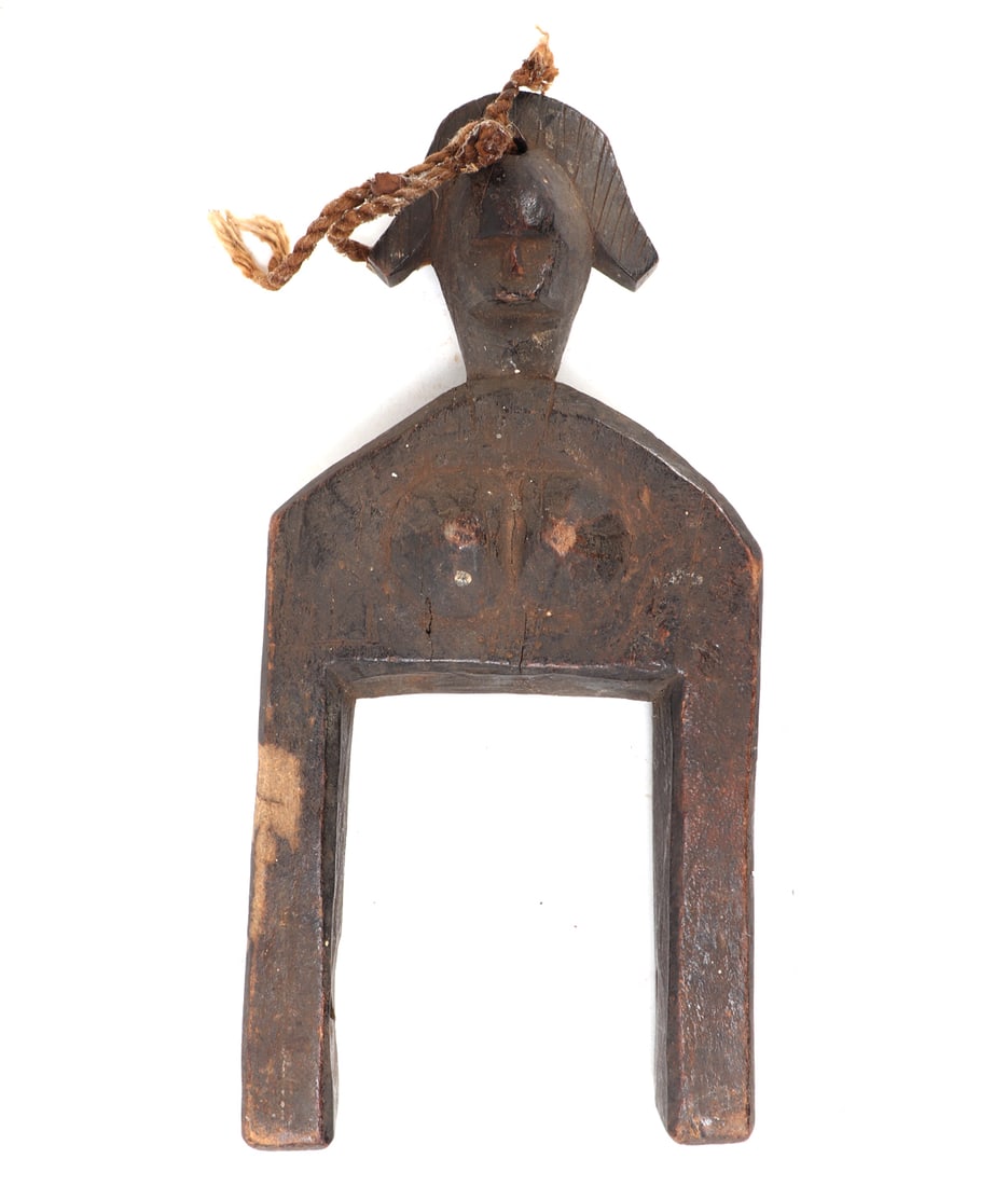 Female Wood Carved Heddle Pulley: Unique wood carved African female shaped heddle pulley for textile weaving. Drilled through the top for suspension and storage. Size 8 3/8" L, weight 200 g Collected prior to 2008, ex-Lacy Gallery